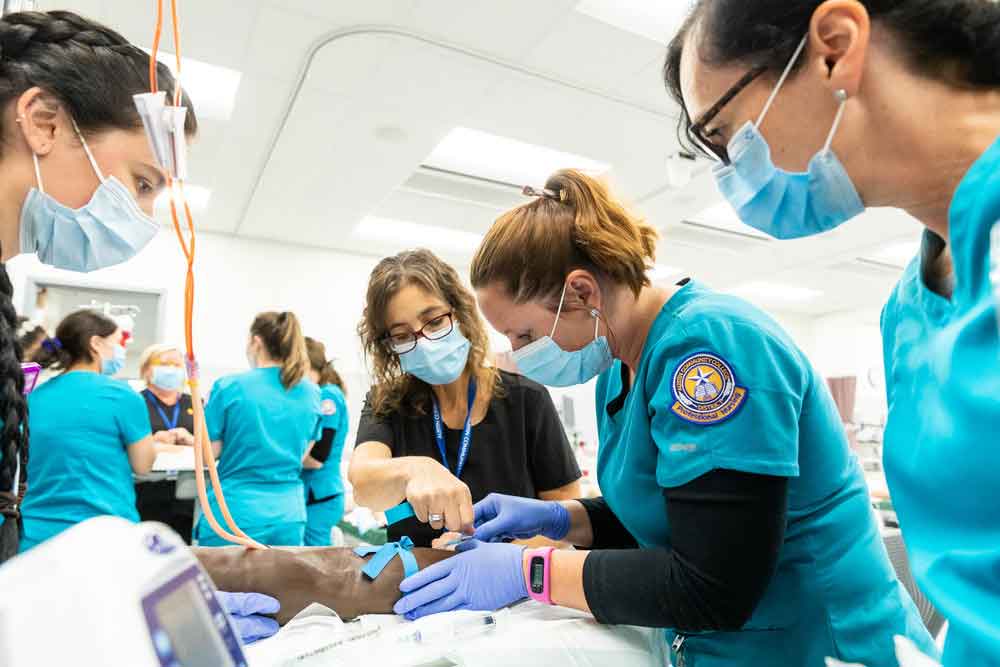 ACC Associate Degree in Nursing (ADN) students and faculty attend a Level 2, IV Therapy Lab inside one of the new state of the art Simulation Labs at the Highland Campus.