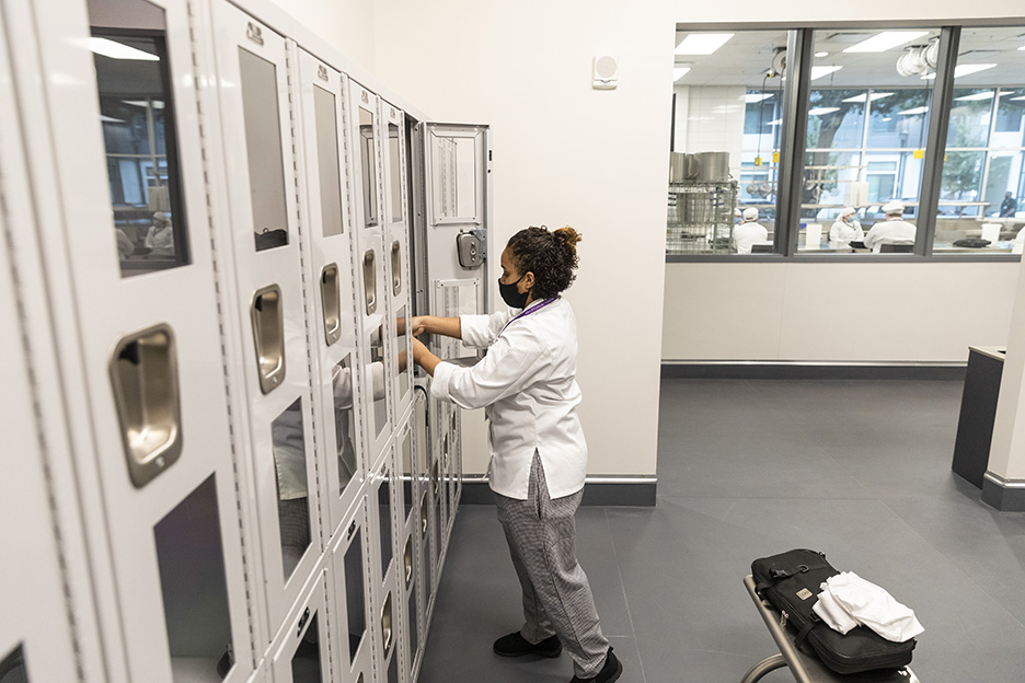 ACC Culinary Arts student Ora E. leaves her personal belongings in one of the lockers located by the kitchen inside Highland Campus, Building 2000 where her first class of the spring 2021 semester, Meat Prep with Chef David Waggoner, is about to start.