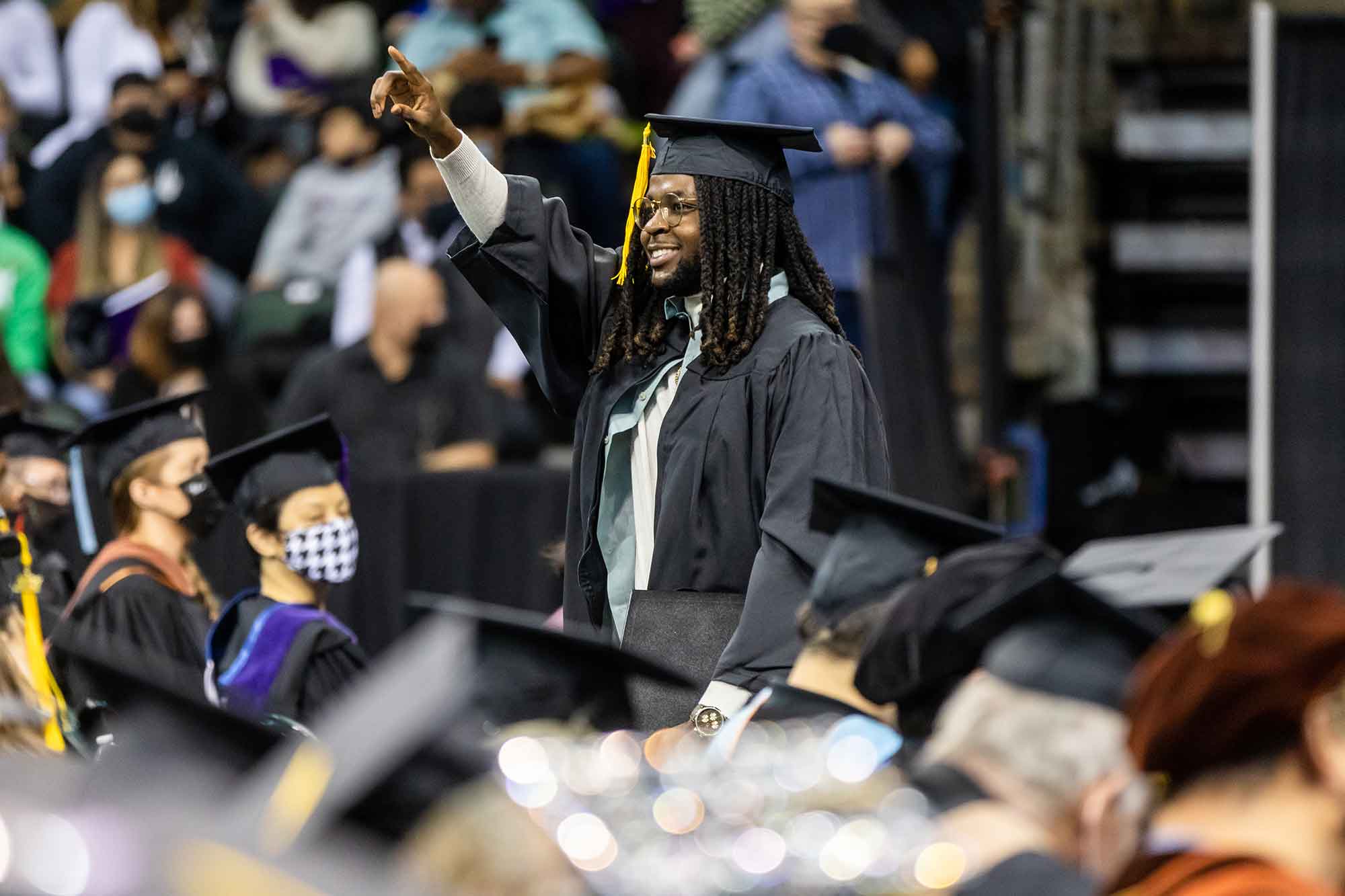 An ACC student celebrates during Fall 2021 commencement ceremony