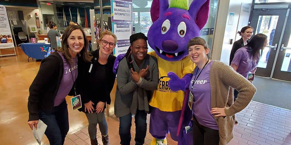 Attendees pose with ACC Mascot, R.B., at ACC Fest 2019.