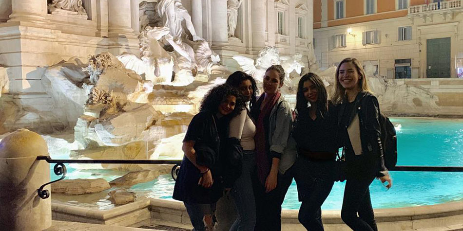 Sarah Alanis and friends pose by the Trevi Fountain in Rome, Italy.