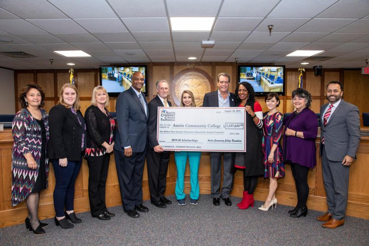 ACC Board of Trustees accept a check for $1.34 million from the ACC Foundation for 2019-2020 student scholarships