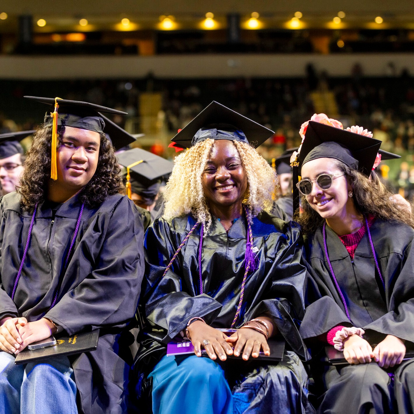 Academic & Career Programs | Austin Community College District ACC Students at Graduation posing for a photo.